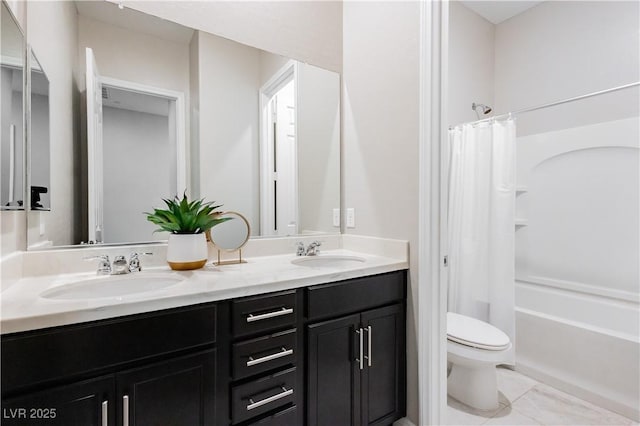2450 Amatrice St, Henderson, NV 89044 - full bath featuring toilet, double vanity, and shower / bath combo with shower curtain