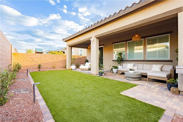 2450 Amatrice St, Henderson, NV 89044 - view of yard featuring an outdoor hangout area and a patio