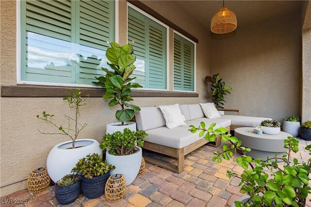 2450 Amatrice St, Henderson, NV 89044 - view of patio with an outdoor living space