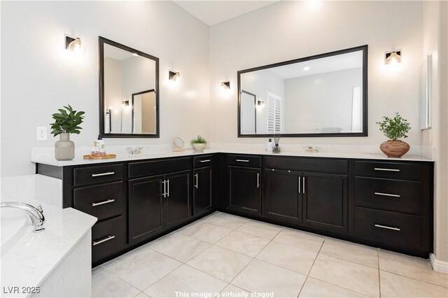 2450 Amatrice St, Henderson, NV 89044 - bathroom featuring double vanity and tile patterned flooring