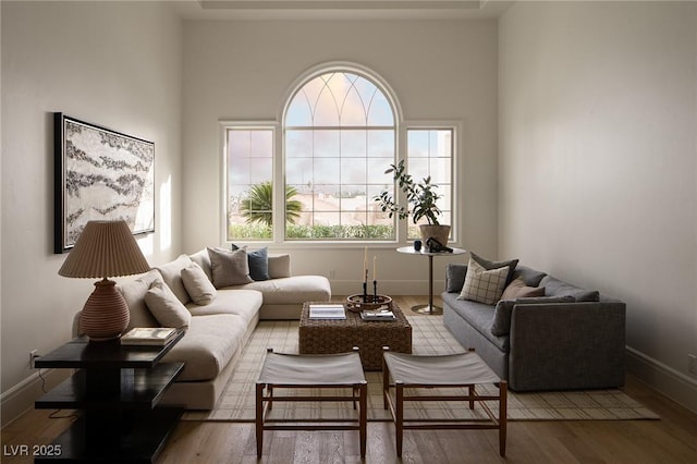 1610 Brock Ct, Las Vegas, NV 89117 - living area featuring healthy amount of natural light, wood finished floors, and baseboards