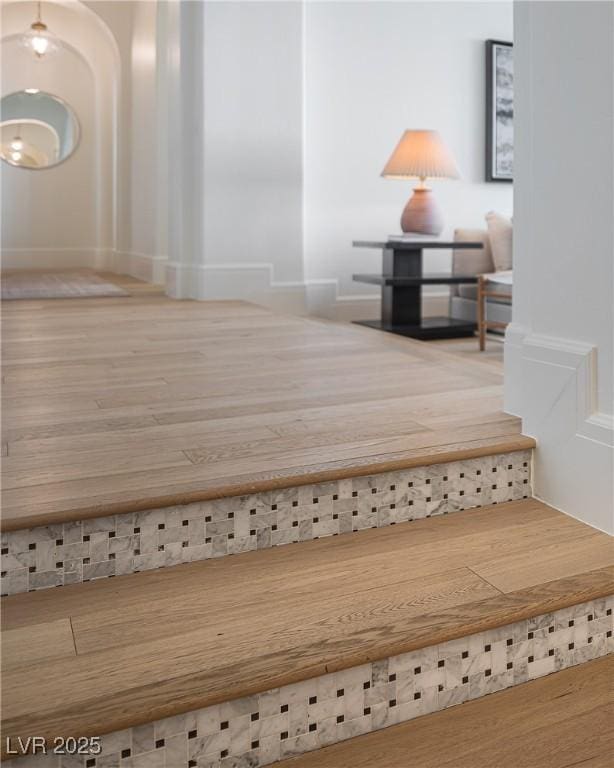 1610 Brock Ct, Las Vegas, NV 89117 - stairs with baseboards and wood finished floors