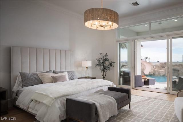 1610 Brock Ct, Las Vegas, NV 89117 - bedroom featuring access to outside, wood finished floors, a chandelier, and crown molding