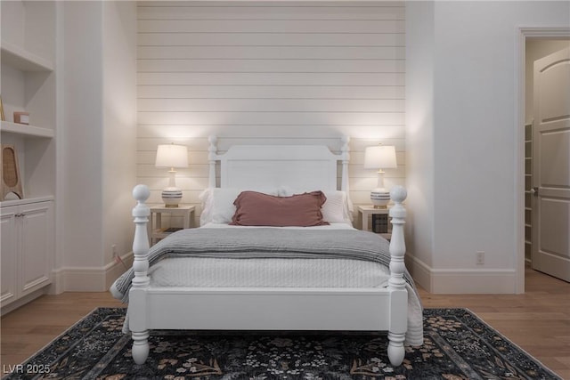 1610 Brock Ct, Las Vegas, NV 89117 - bedroom featuring baseboards and light wood-style flooring