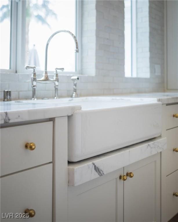 1610 Brock Ct, Las Vegas, NV 89117 - bathroom with vanity and healthy amount of natural light