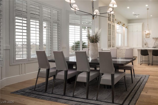 1610 Brock Ct, Las Vegas, NV 89117 - dining room featuring light wood-style floors, a chandelier, and recessed lighting