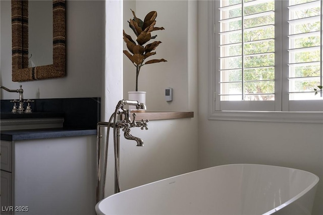 1610 Brock Ct, Las Vegas, NV 89117 - full bathroom featuring a soaking tub and vanity