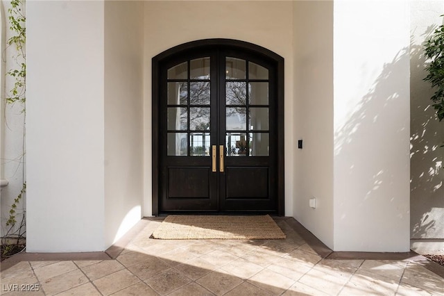 1610 Brock Ct, Las Vegas, NV 89117 - doorway to property featuring french doors and stucco siding