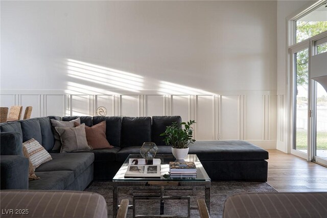 1610 Brock Ct, Las Vegas, NV 89117 - living area featuring a decorative wall, wood finished floors, and wainscoting