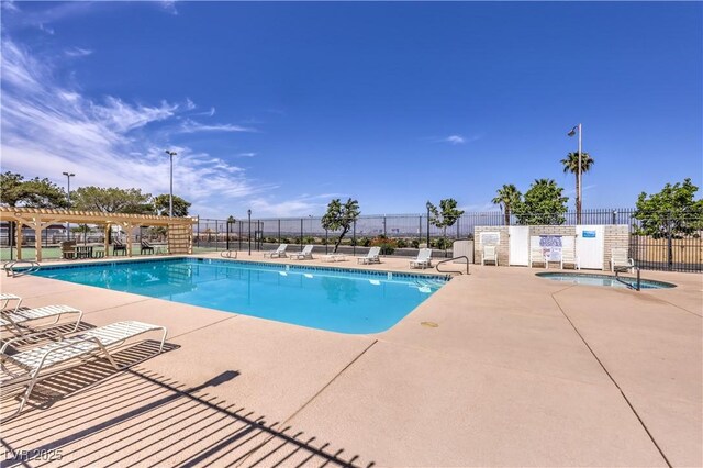 1157 Morning Sun Way, Las Vegas, NV 89110 - community pool featuring a pergola, fence, and a patio area