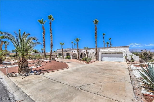 1157 Morning Sun Way, Las Vegas, NV 89110 - view of front facade with driveway, an attached garage, and fence