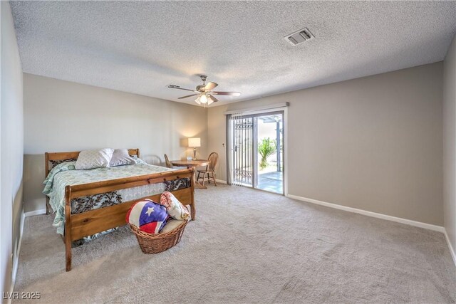1157 Morning Sun Way, Las Vegas, NV 89110 - bedroom featuring access to exterior, carpet, baseboards, a textured ceiling, and ceiling fan