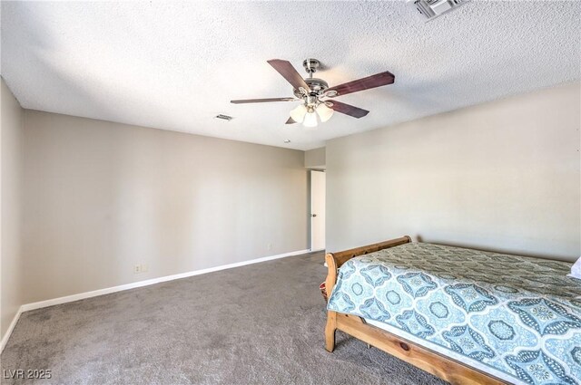 1157 Morning Sun Way, Las Vegas, NV 89110 - carpeted bedroom with baseboards, a textured ceiling, and a ceiling fan