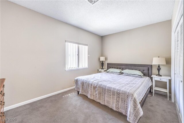 1157 Morning Sun Way, Las Vegas, NV 89110 - bedroom with carpet flooring, baseboards, and a textured ceiling