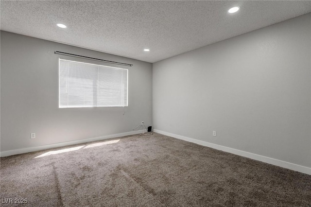 7905 Idledale Ct Unit 102, Las Vegas, NV 89145 - carpeted spare room featuring a textured ceiling, recessed lighting, and baseboards
