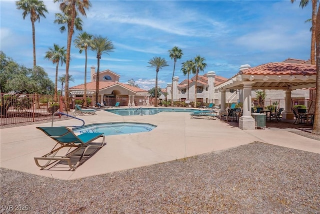 7905 Idledale Ct Unit 102, Las Vegas, NV 89145 - community pool with a gazebo, fence, and a patio
