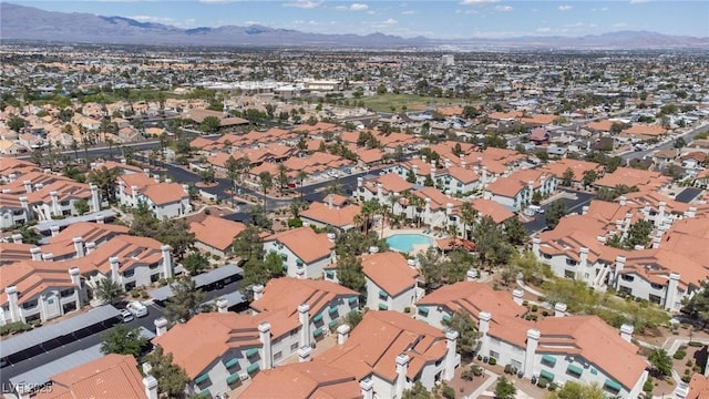 7905 Idledale Ct Unit 102, Las Vegas, NV 89145 - aerial overview of property's location featuring a mountain backdrop and nearby suburban area