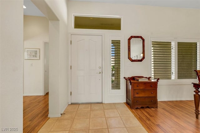 10532 Sea Palms Ave, Las Vegas, NV 89134 - foyer with healthy amount of natural light and light wood finished floors