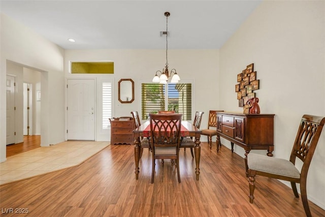 10532 Sea Palms Ave, Las Vegas, NV 89134 - dining room with a chandelier, light wood-style floors, and recessed lighting