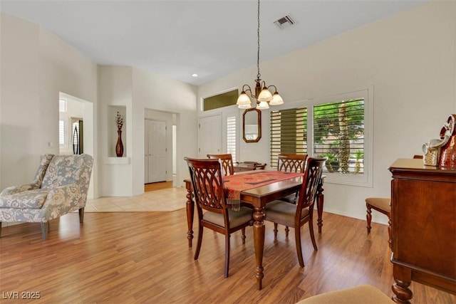 10532 Sea Palms Ave, Las Vegas, NV 89134 - dining area with plenty of natural light, a chandelier, and light wood-type flooring