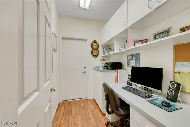 10532 Sea Palms Ave, Las Vegas, NV 89134 - office area featuring built in desk and light wood-style flooring