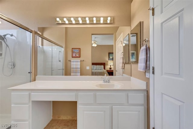 10532 Sea Palms Ave, Las Vegas, NV 89134 - full bath with connected bathroom, a stall shower, ceiling fan, vanity, and tile patterned floors