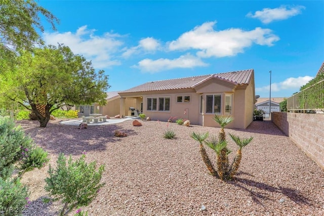 10532 Sea Palms Ave, Las Vegas, NV 89134 - rear view of house with stucco siding, a tile roof, and a patio area