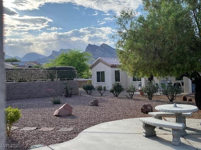 10532 Sea Palms Ave, Las Vegas, NV 89134 - exterior space with a mountain view and a patio area