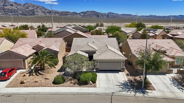 2108 Willow Wren Dr, North Las Vegas, NV 89084 - aerial perspective of suburban area with a mountainous background
