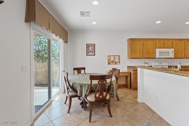 2108 Willow Wren Dr, North Las Vegas, NV 89084 - dining room with recessed lighting and light tile patterned floors