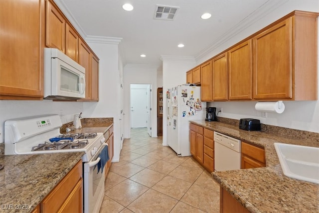 2108 Willow Wren Dr, North Las Vegas, NV 89084 - kitchen with white appliances, a sink, crown molding, stone countertops, and light tile patterned floors