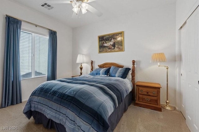 2108 Willow Wren Dr, North Las Vegas, NV 89084 - bedroom with light colored carpet, a closet, and ceiling fan