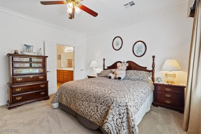 2108 Willow Wren Dr, North Las Vegas, NV 89084 - bedroom with light colored carpet, ornamental molding, ensuite bathroom, and a ceiling fan