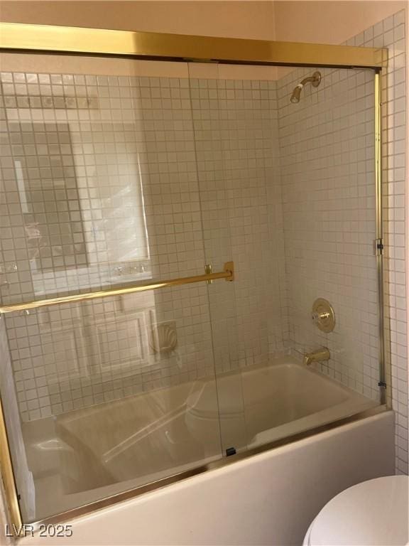 3394 Brookfield Dr, Las Vegas, NV 89120 - bathroom featuring toilet and combined bath / shower with glass door