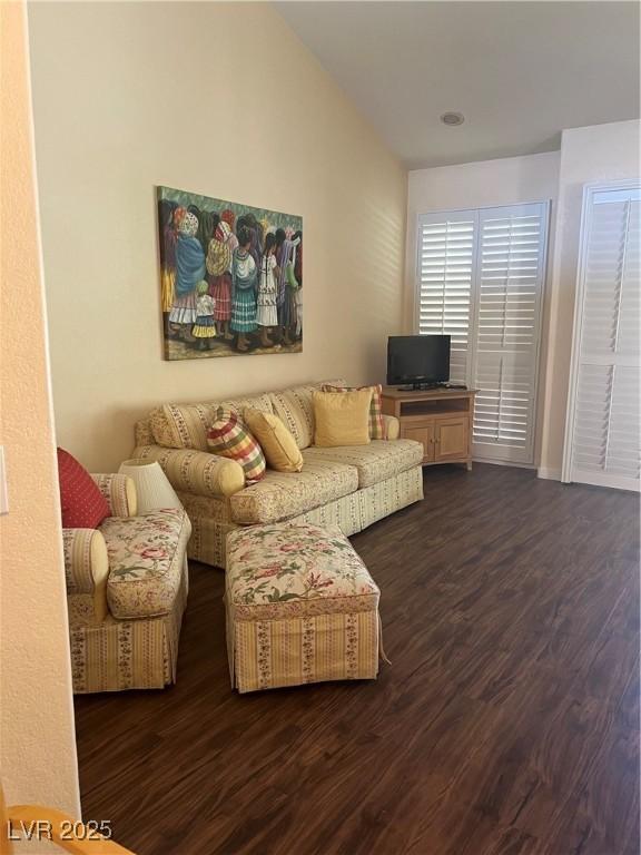 3394 Brookfield Dr, Las Vegas, NV 89120 - living room featuring dark wood-type flooring and baseboards