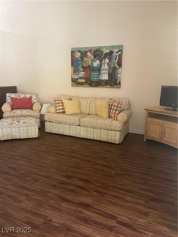 3394 Brookfield Dr, Las Vegas, NV 89120 - living area with dark wood-style flooring and baseboards