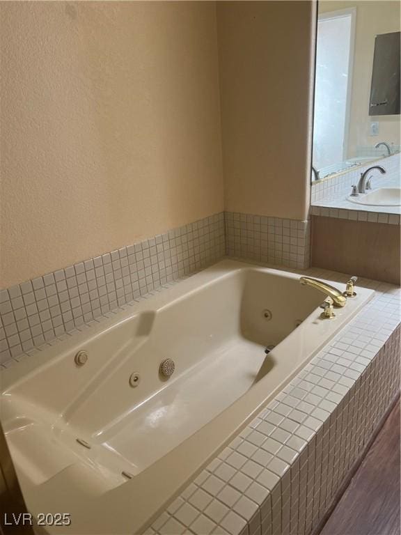 3394 Brookfield Dr, Las Vegas, NV 89120 - full bathroom with a jetted tub and vanity