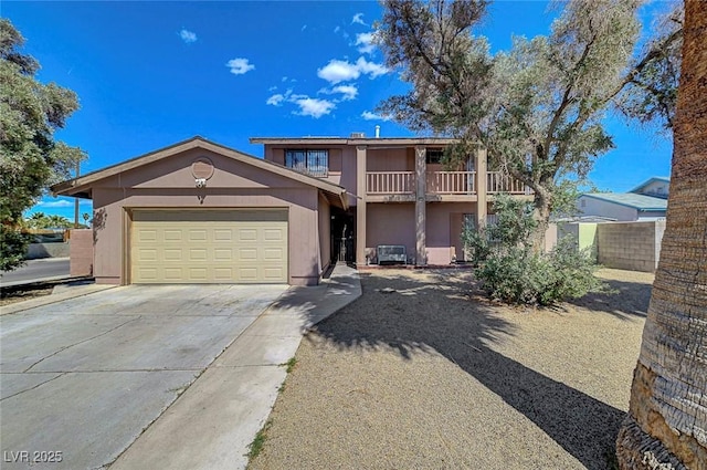 3018 Burnham Ave, Las Vegas, NV 89169 - view of front of house featuring driveway, a garage, and stucco siding