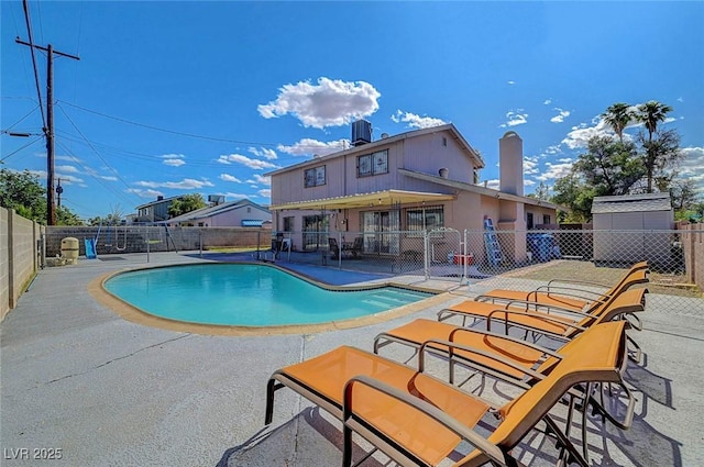 3018 Burnham Ave, Las Vegas, NV 89169 - view of pool featuring a patio area, fence, and central AC unit