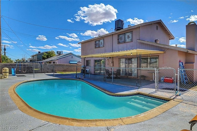 3018 Burnham Ave, Las Vegas, NV 89169 - view of swimming pool featuring a patio, fence, and a gate