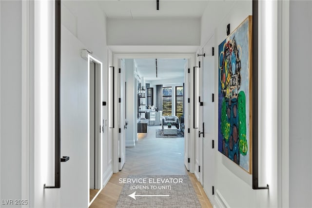 corridor with parquet flooring
