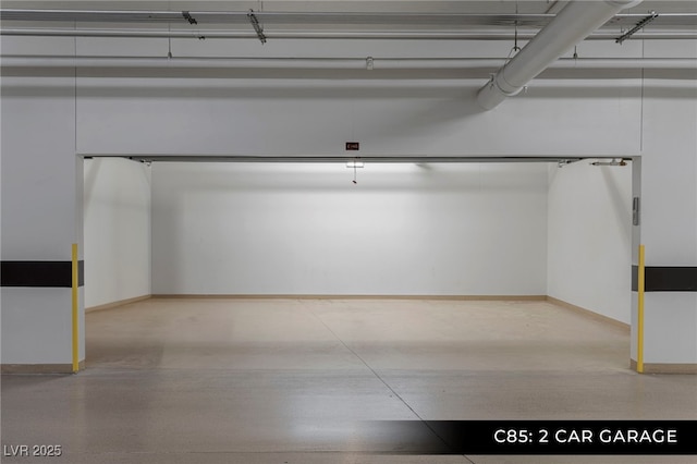 garage featuring baseboards