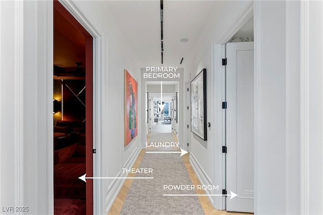 hallway with light wood finished floors