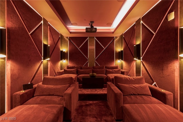 home theater room featuring a tray ceiling