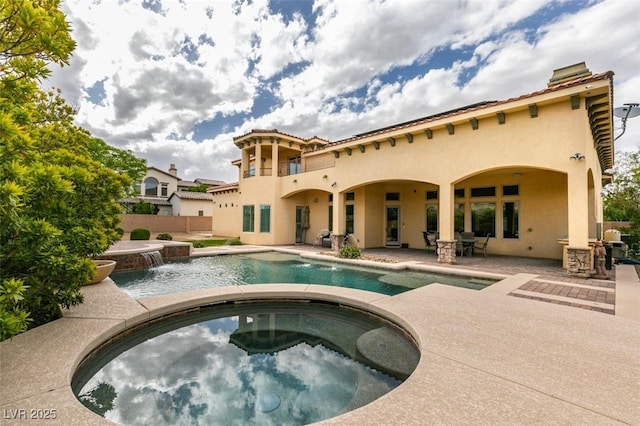 9749 Glistening Brook Ct, Las Vegas, NV 89149 - outdoor pool with an in-ground hot tub, a patio area, and fence