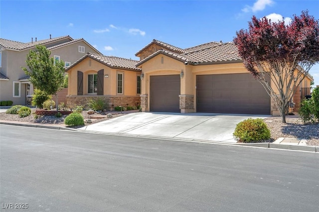 view of front of property featuring a garage, stucco siding, a tiled roof, stone siding, and driveway
