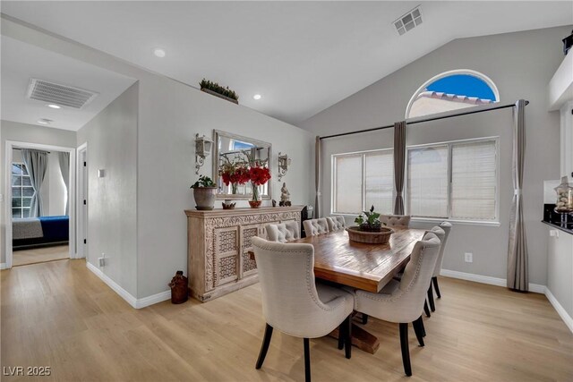 4617 Mancilla St, Las Vegas, NV 89130 - dining area with light wood-style floors, plenty of natural light, vaulted ceiling, baseboards, and recessed lighting