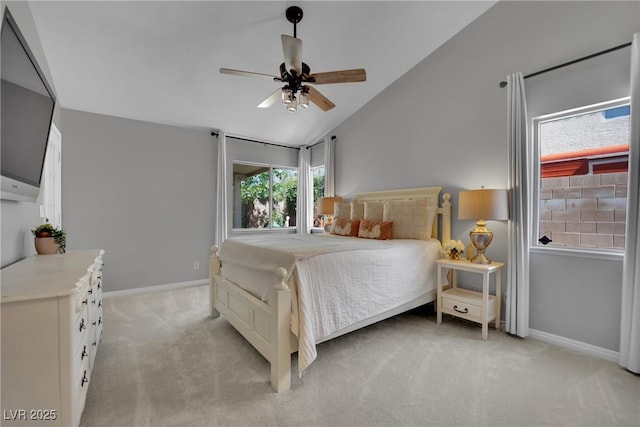 4617 Mancilla St, Las Vegas, NV 89130 - bedroom featuring light carpet, vaulted ceiling, baseboards, and ceiling fan