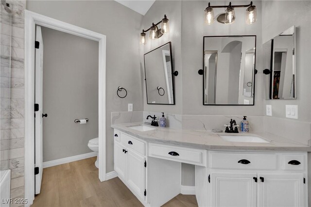 4617 Mancilla St, Las Vegas, NV 89130 - full bath featuring double vanity, wood finished floors, a bathtub, and a shower