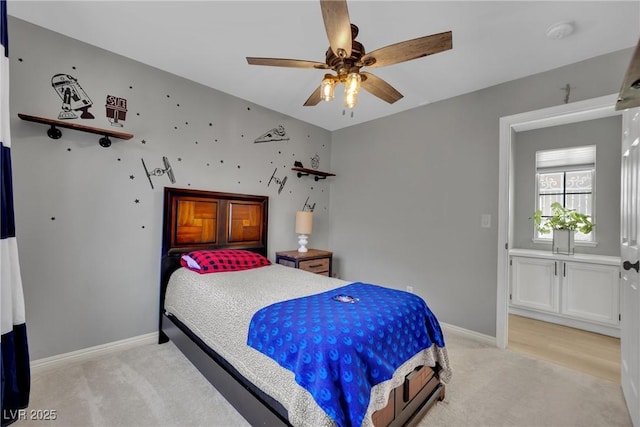 4617 Mancilla St, Las Vegas, NV 89130 - bedroom featuring light colored carpet, baseboards, and a ceiling fan